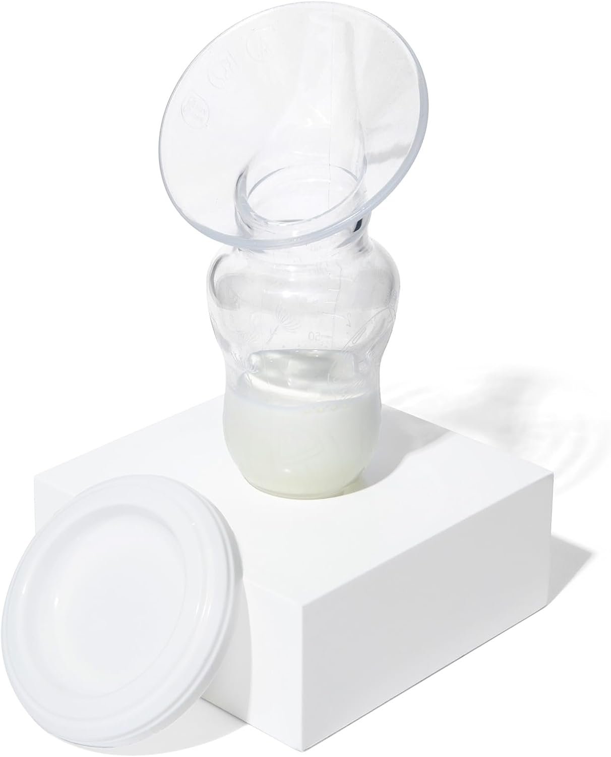 Motif Medical Manual Handheld Breast Pump - Portable Breast Milk Pump for New Mothers - Flexible & Air Powered Suction Silicone Breast Pump - Nursing Essentials for Newborn Babies (4oz, Clear)